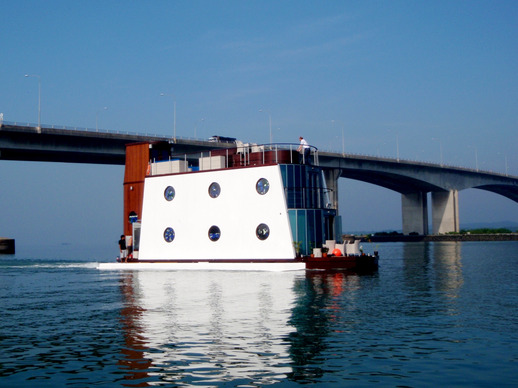 Kevin Hill's completed Nautilus 55 steel-hull Water Suite underway at Raffles Marina