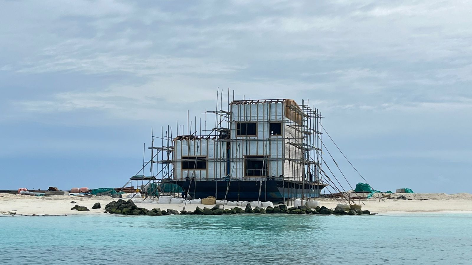 Front elevation of a Water Suite under construction with the Steel Solution v1.0 hull visible below